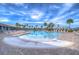 Large community pool with plenty of lounge chairs for sunbathing at 15629 Black Pepper Ln, Odessa, FL 33556