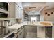 Modern kitchen with stainless steel appliances and an open layout at 100 4Th S Ave # 205, St Petersburg, FL 33701