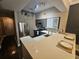 Modern kitchen with stainless steel appliances and breakfast bar at 100 4Th S Ave # 205, St Petersburg, FL 33701