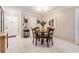 Dining area with a round table and four chairs at 4611 W Fig St # 209, Tampa, FL 33609