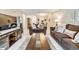 Spacious living room featuring comfortable sofas and a large TV at 4611 W Fig St # 209, Tampa, FL 33609