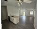 Modern kitchen with white cabinets and stainless steel appliances at 13625 Laraway Dr, Riverview, FL 33579