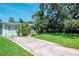 Ranch style home with a spacious lawn and long driveway at 3623 S Gardenia Ave, Tampa, FL 33629