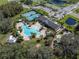 Aerial view of community pool, tennis courts, playground, and clubhouse at 19343 Hawk Valley Dr, Tampa, FL 33647