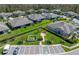 Aerial view of community with homes and green spaces at 19343 Hawk Valley Dr, Tampa, FL 33647