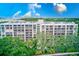 Multi-story building with balconies overlooking the water at 220 Belleview Blvd # 802, Belleair, FL 33756