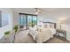 Bright bedroom with balcony access and water view at 220 Belleview Blvd # 802, Belleair, FL 33756