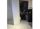 Walk-in closet with clothes and shelving at 2722 W Union St # 1/2, Tampa, FL 33607