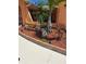 A lovely landscaped front yard with mulch, rock features, and trees adds visual interest to this home's exterior at 7906 Willow Brook Ct, Hudson, FL 34667