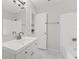 Clean bathroom, featuring a vanity, bathtub, and tiled floor at 12267 Armenia Gables Cir # 12267, Tampa, FL 33612