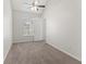 Bright bedroom with carpeted floor, ceiling fan, and window at 12267 Armenia Gables Cir # 12267, Tampa, FL 33612