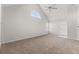 Open living area with vaulted ceiling and neutral decor at 12267 Armenia Gables Cir # 12267, Tampa, FL 33612