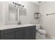 Updated bathroom with gray vanity and marble-look tile at 12267 Armenia Gables Cir # 12267, Tampa, FL 33612
