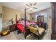 Spacious bedroom with a large bed, wooden furniture, and plenty of natural light at 11537 Southern Creek Dr, Gibsonton, FL 33534
