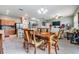 Open concept dining area with kitchen views, and a large table at 11537 Southern Creek Dr, Gibsonton, FL 33534