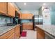 Modern kitchen with stainless steel appliances and granite countertops at 11537 Southern Creek Dr, Gibsonton, FL 33534