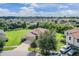 Aerial view of a single-Gathering house near a residential neighborhood at 11537 Southern Creek Dr, Gibsonton, FL 33534