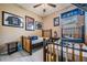 Bedroom with twin beds, baseball decor, and ceiling fan at 11537 Southern Creek Dr, Gibsonton, FL 33534