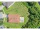 Aerial view of a house with a large backyard, next to green space at 11537 Southern Creek Dr, Gibsonton, FL 33534