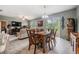 Dining area with view into living room and kitchen at 11537 Southern Creek Dr, Gibsonton, FL 33534