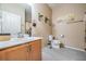 Clean bathroom with a single sink vanity and shower/tub combo at 11537 Southern Creek Dr, Gibsonton, FL 33534