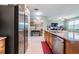 Kitchen boasts stainless steel appliances and granite countertops at 11537 Southern Creek Dr, Gibsonton, FL 33534