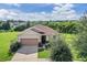 Single-Gathering home with a two-car garage and a spacious yard at 11537 Southern Creek Dr, Gibsonton, FL 33534