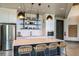 Modern community kitchen features a breakfast bar and sleek appliances at 5700 Spivey Ct, Wesley Chapel, FL 33545
