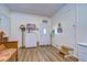 Entryway with coat rack and storage at 4976 Britni Way, Zephyrhills, FL 33541