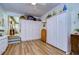 Storage room with built-in cabinets and extra storage at 4976 Britni Way, Zephyrhills, FL 33541