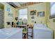 Laundry room with washer, dryer, and storage at 4976 Britni Way, Zephyrhills, FL 33541