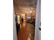 Living room with hardwood floors and access to other rooms at 2351 Bentley Dr, Palm Harbor, FL 34684