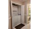 Convenient laundry room with washer and dryer, overhead cabinets, and tiled floor at 2351 Bentley Dr, Palm Harbor, FL 34684