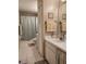 Clean bathroom with shower/tub combo, vanity, and tiled floor at 2351 Bentley Dr, Palm Harbor, FL 34684