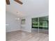 Bright dining room with vinyl flooring and sliding glass doors leading to the backyard at 2039 Shadow Pine Dr, Brandon, FL 33511