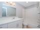 Clean bathroom with white vanity, bathtub, and tiled walls at 2039 Shadow Pine Dr, Brandon, FL 33511