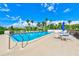 Refreshing community pool with ample seating and patio area at 220 Belleview Blvd # 802, Belleair, FL 33756