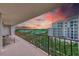 Spacious balcony overlooking the community and sunset at 220 Belleview Blvd # 802, Belleair, FL 33756