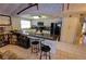 Modern kitchen with black appliances and granite island at 7906 Willow Brook Ct, Hudson, FL 34667
