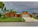 Charming single-story home with a two-car garage at 7906 Willow Brook Ct, Hudson, FL 34667