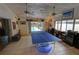 Game room featuring ping pong and access to the pool at 7906 Willow Brook Ct, Hudson, FL 34667