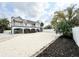 Home's backyard featuring ample space and greenery at 6710 Myrna Dr, Tampa, FL 33619