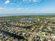 Expansive aerial view of waterfront community with various homes and canals at 5823 Dory Way, Tampa, FL 33615