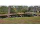 Picturesque backyard featuring a pond with deer, perfect for nature lovers at 4467 Worthington Ct, Palm Harbor, FL 34685