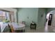 Dining Area featuring tile flooring, table with chairs, and a small decorative table at 4467 Worthington Ct, Palm Harbor, FL 34685