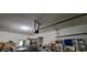 Well-lit garage with an automatic door opener and ample storage space, maximizing functionality at 4467 Worthington Ct, Palm Harbor, FL 34685
