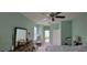 Spacious main bedroom with access to en-suite bath, featuring natural light and neutral tones at 4467 Worthington Ct, Palm Harbor, FL 34685