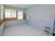 Open room with a window, and light-colored walls and flooring at 4810 Chancellor Ne St, St Petersburg, FL 33703