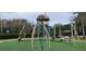 playground with climbing structures and swings at 4467 Worthington Ct, Palm Harbor, FL 34685