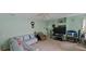Spacious living room with large TV and comfortable seating at 4467 Worthington Ct, Palm Harbor, FL 34685